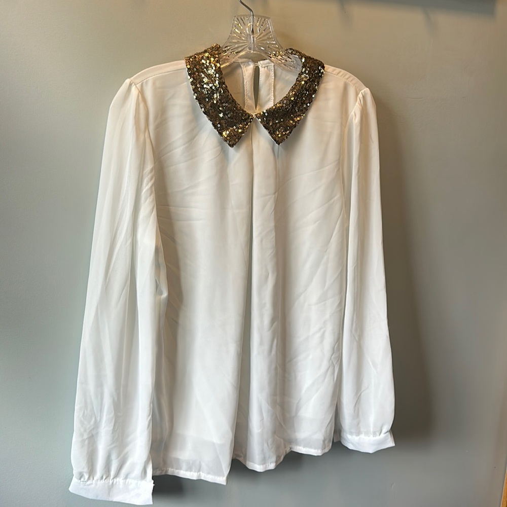 New never worn beautiful blouse with gold sequin collar. Long sleeve. Xl white